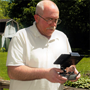 Aerotech Photography owner Mike Smith operating one of his drones